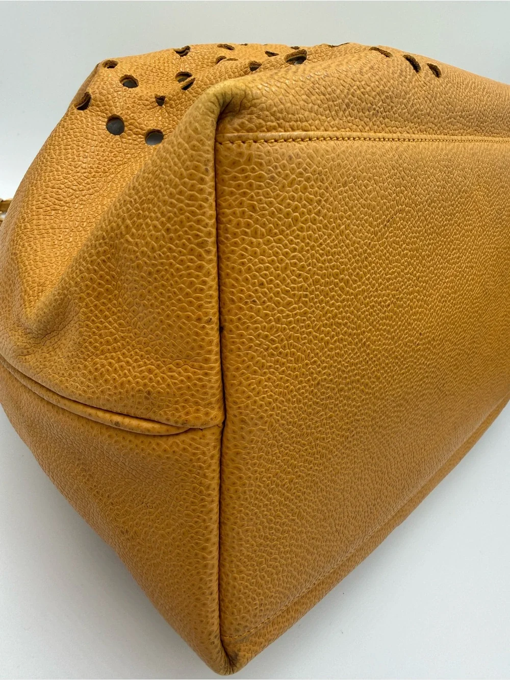 Chanel Perforated Drawstring Bucket Bag in Caviar Leather